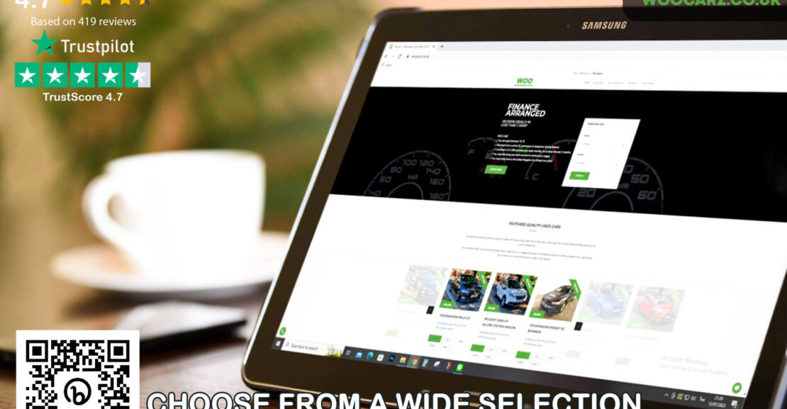 WOO Carz graphic showing a tablet on a table