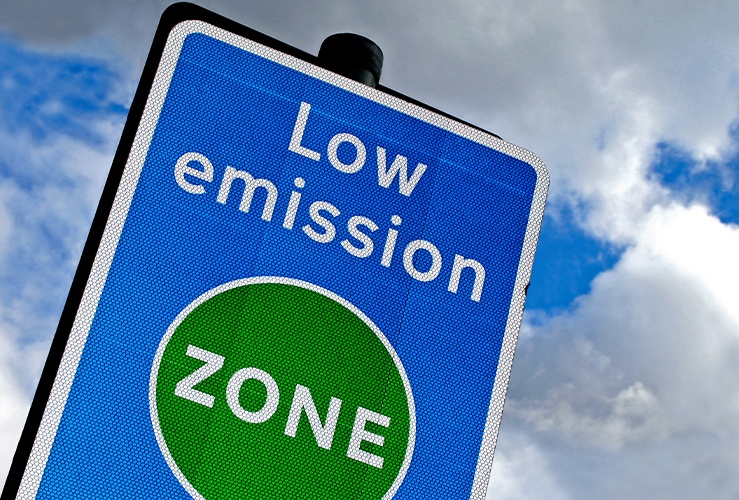 Low emission road sign