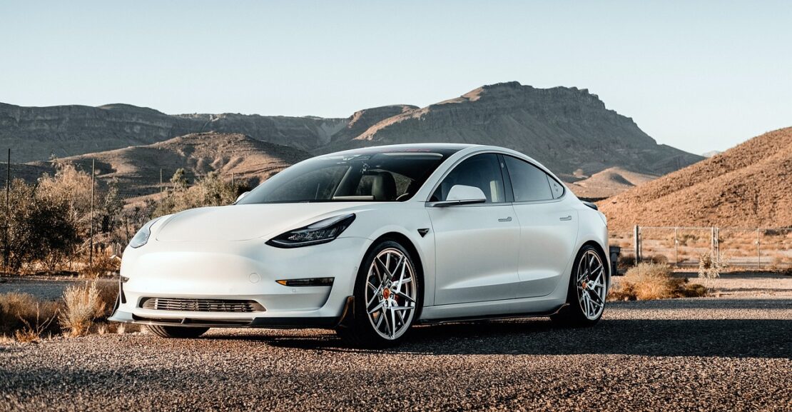 white tesla model 3 car