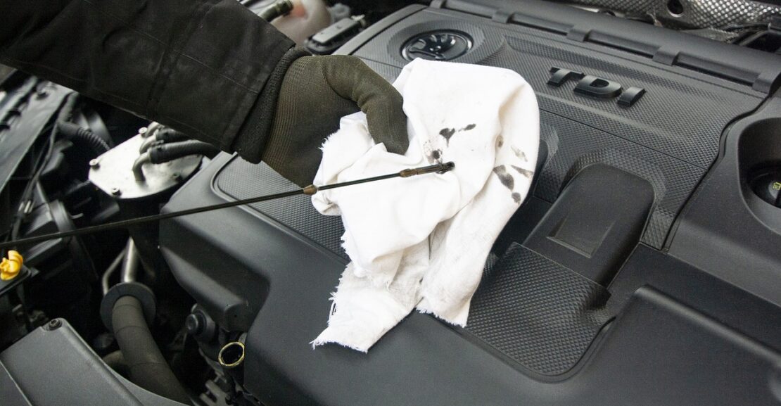 image of an oil check on a car