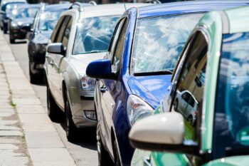 a row of random parked cars