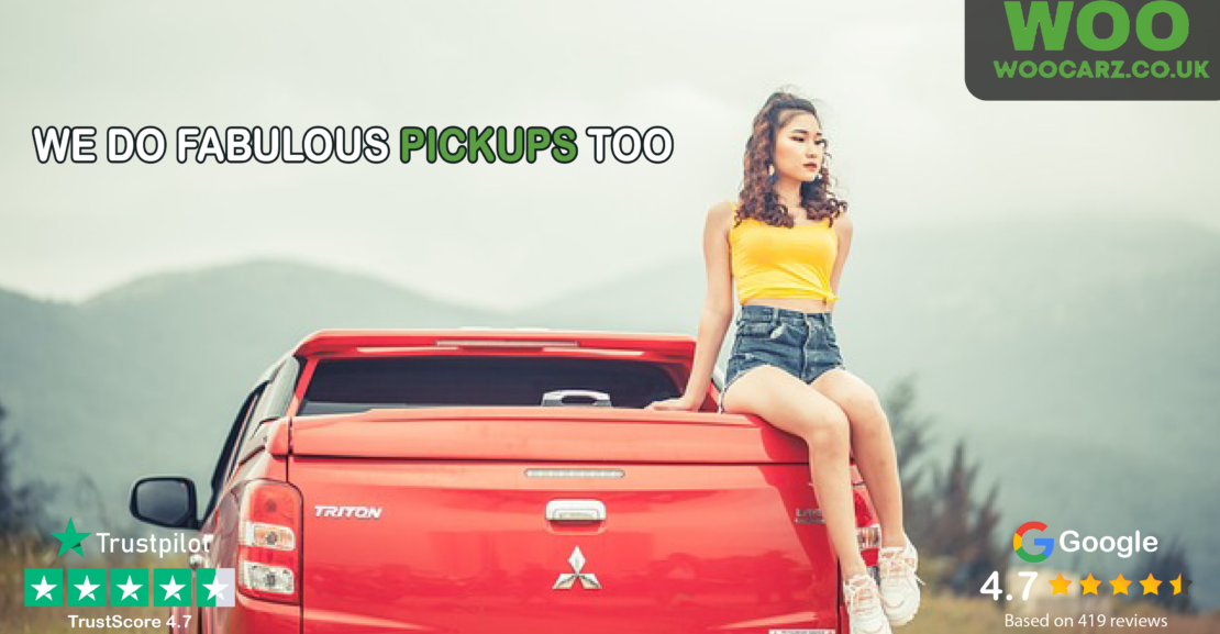 image of a woman sitting on the back of a pickup truck